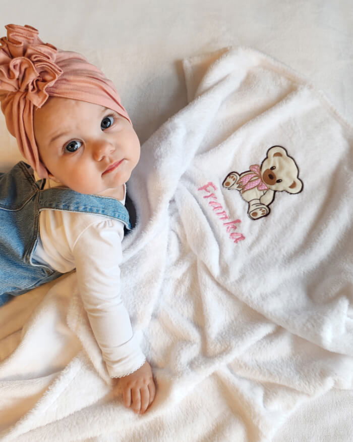 Cute baby Franka posing with her personalized blanket