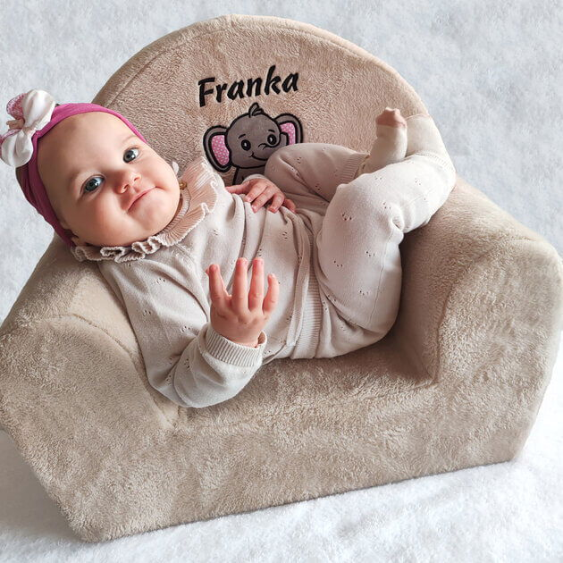 Baby Franka enjoys in a personalized armchair.